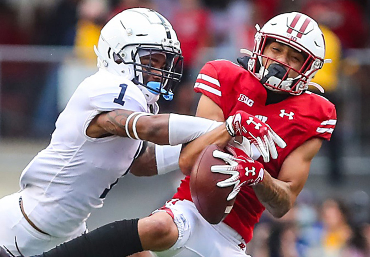 Wisconsin Badgers football's Danny Davis (7) can t hold on to this pass while Penn State s Jaquan Brisker (1) defends during their game Saturday, September 4, 2021 in Madison, Wis. Penn State won the game 16-10. (Doug Raflik/USA Today Network)