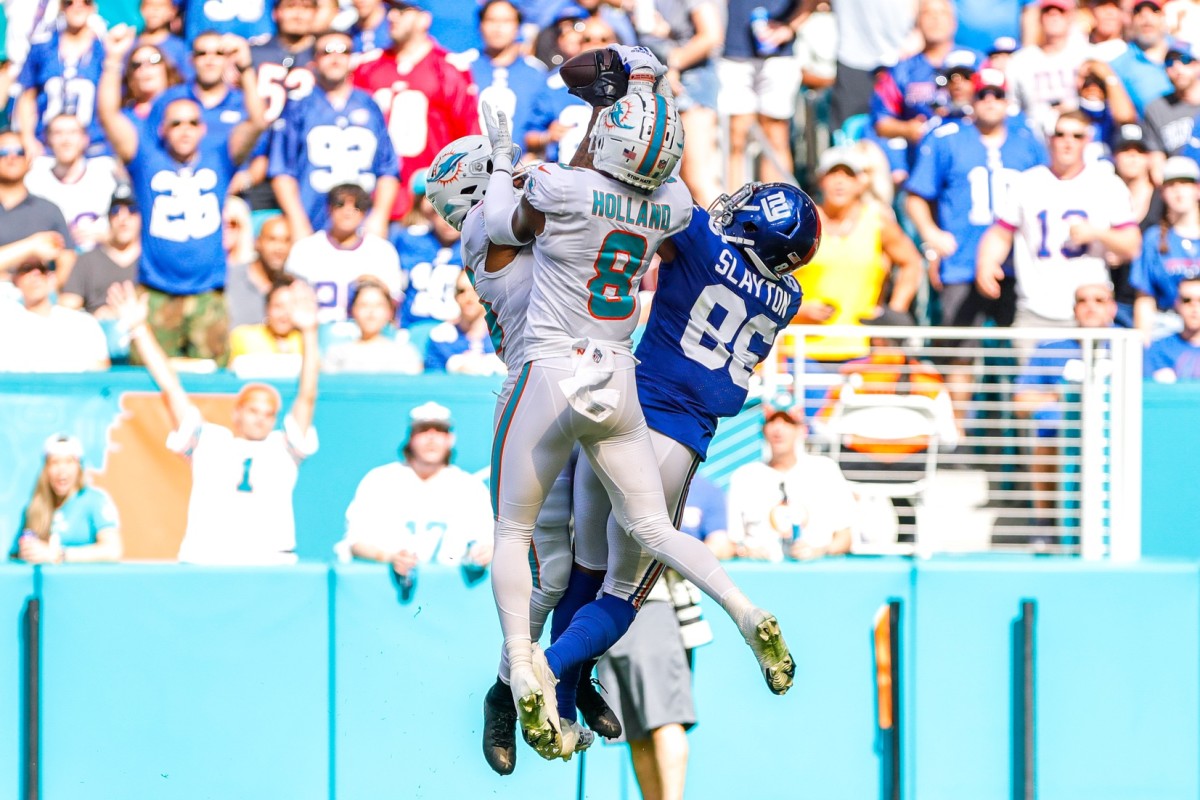 Miami Dolphins cornerback Xavien Howard (25) intercepts a pass intended to Giants wide receiver Darius Slayton (86). Mandatory Credit: Sam Navarro-USA TODAY Sports