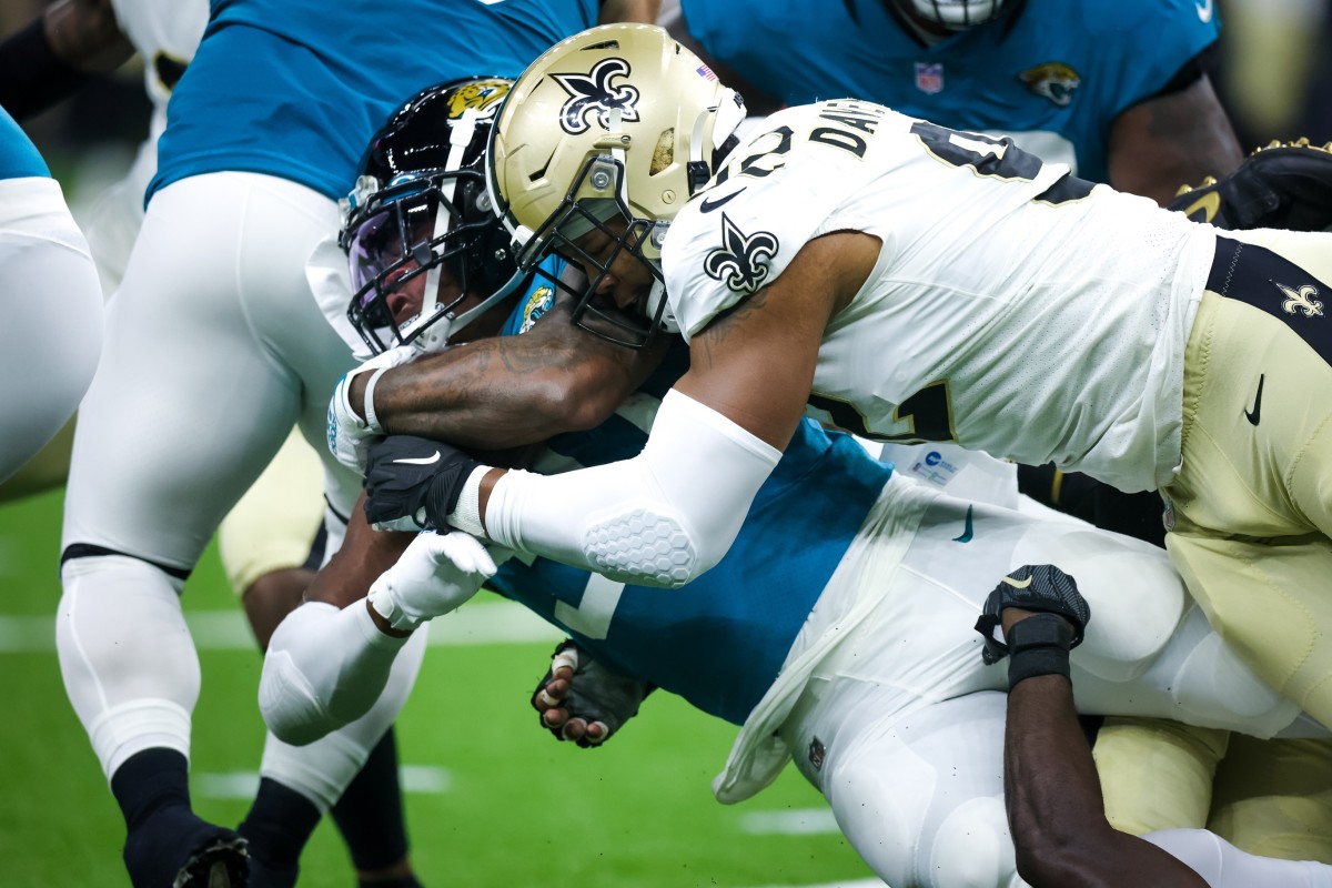 New Orleans Saints defensive end Marcus Davenport (92) tackles Jacksonville Jaguars running back Nathan Cottrell (31). Mandatory Credit: Stephen Lew-USA TODAY Sports