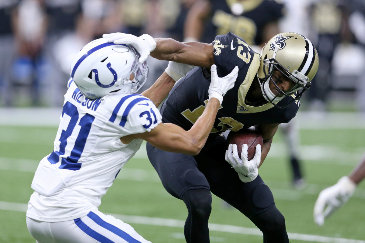 Dec 16, 2019; New Orleans, LA, USA; New Orleans Saints wide receiver Michael Thomas (13) is tackled by Indianapolis Colts cornerback Quincy Wilson (31) in the second quarter at the Mercedes-Benz Superdome. Mandatory Credit: Chuck Cook-USA TODAY Sports