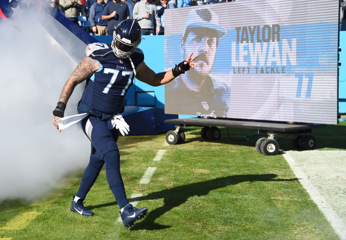 Tennessee Titans offensive tackle Taylor Lewan (77) during player introductions before the game against the Jacksonville Jaguars at Nissan Stadium.