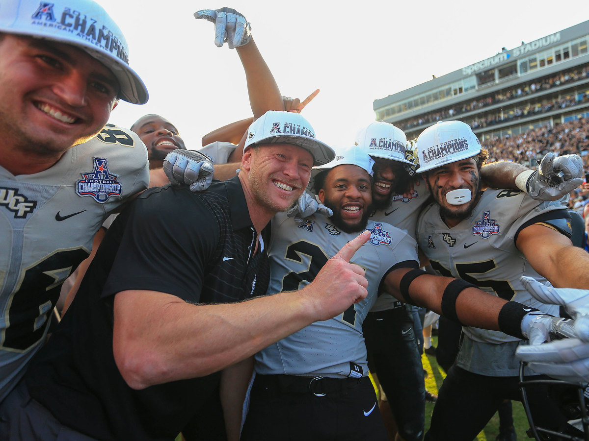 Scott Frost and UCF celebrate their AAC title in 2017.