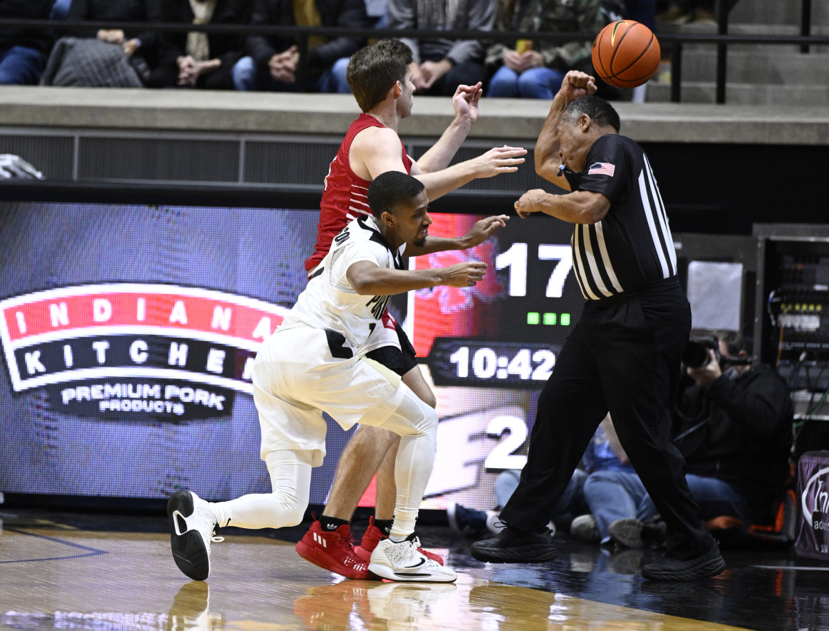 Isaiah Thompson goes for the loose ball.
