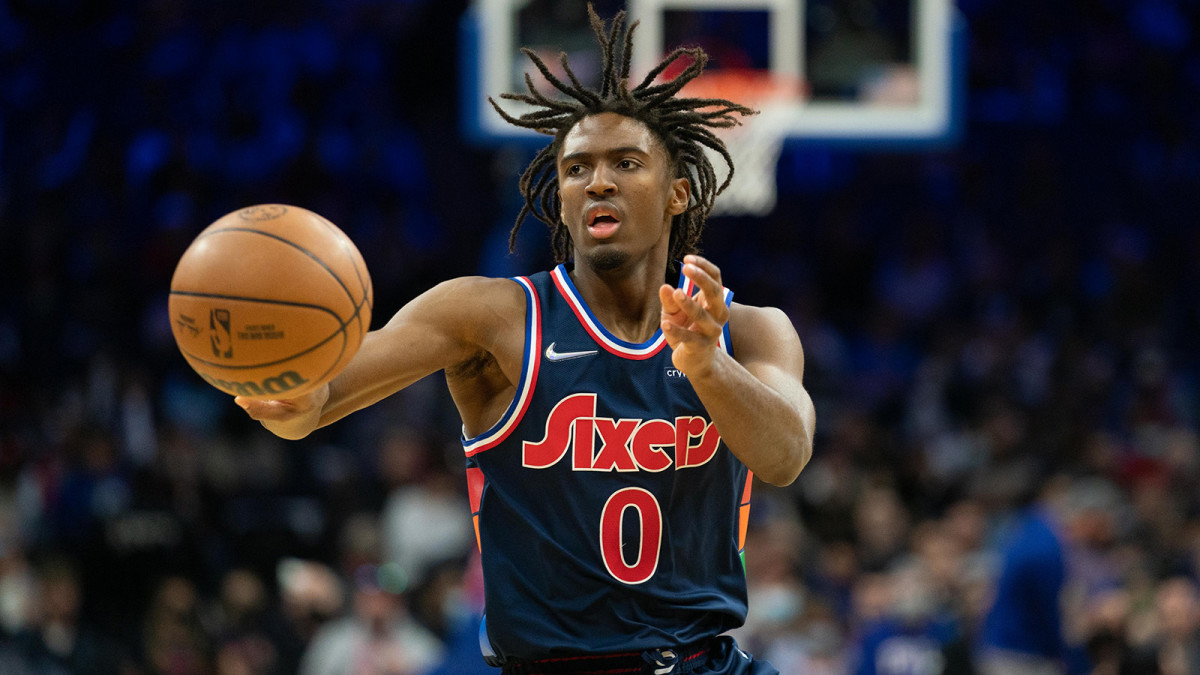 Tyrese Maxey (0) passes the ball against the Miami Heat.