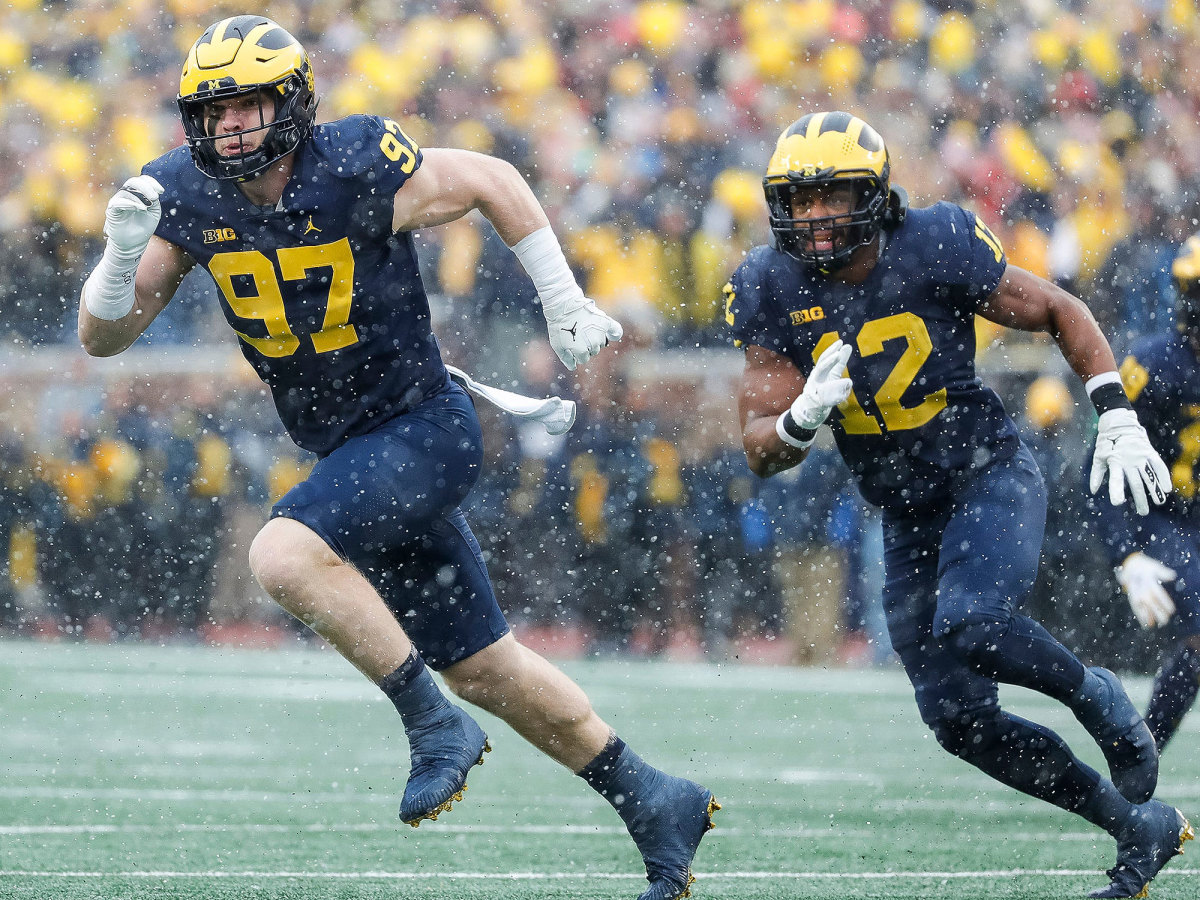 Michigan's Aidan Hutchinson and Josh Ross