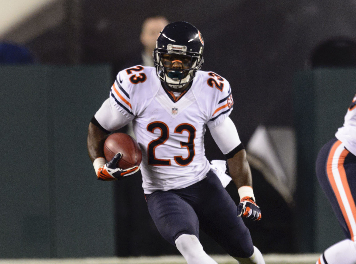Chicago Bears kick returner Devin Hester (23) runs back a kickoff during the first quarter against the Philadelphia Eagles at Lincoln Financial Field.