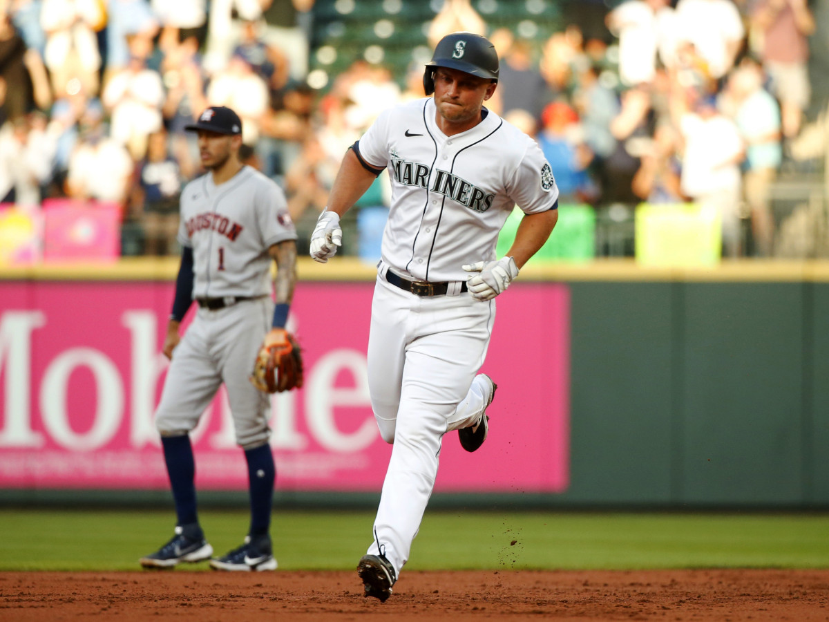 Jul 27, 2021; Seattle, Washington, USA; Seattle Mariners third baseman Kyle Seager (15) runs the bases after hitting a two run home run against the Houston Astros during the first inning at T-Mobile Park.
