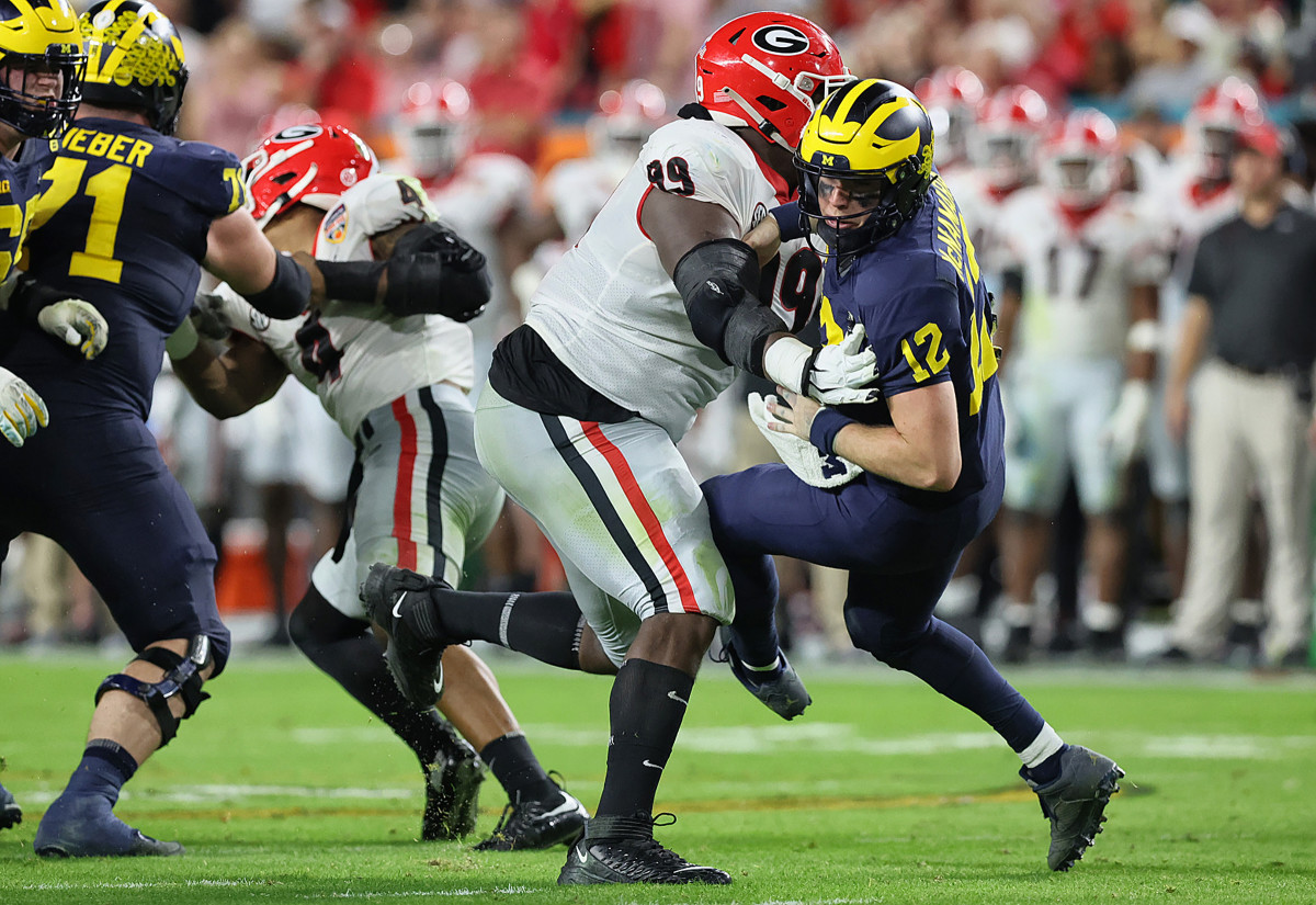 Georgia's Jordan Davis clobbers Michigan QB Cade McNamara