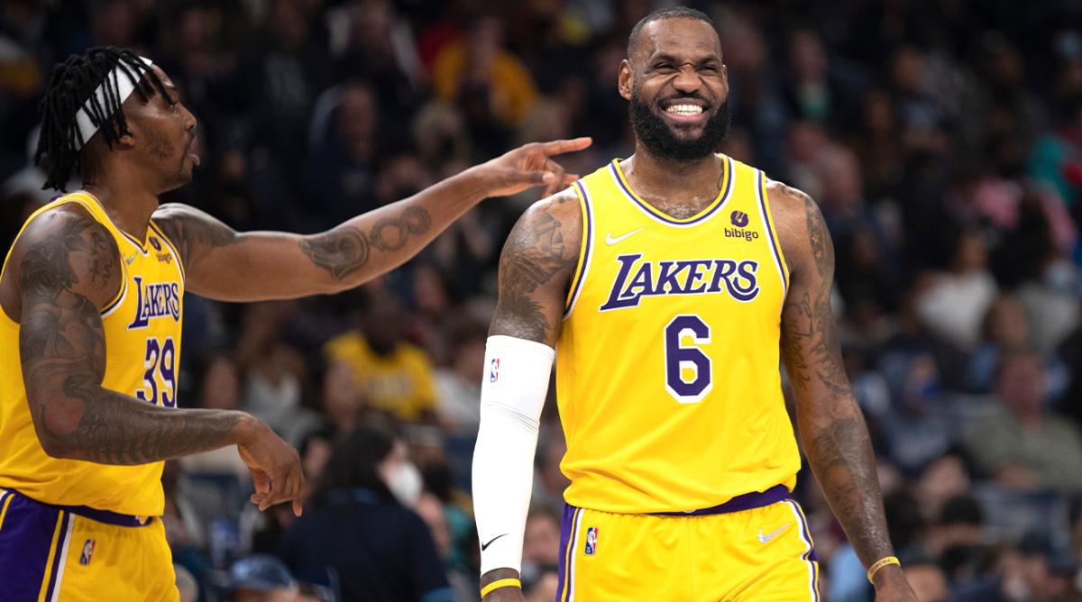 Los Angeles Lakers forward LeBron James (6) gestures as he walks away from a time out followed by center Dwight Howard, left, in the second half of an NBA basketball game against the Memphis Grizzlies Wednesday, Dec. 29, 2021, in Memphis, Tenn.