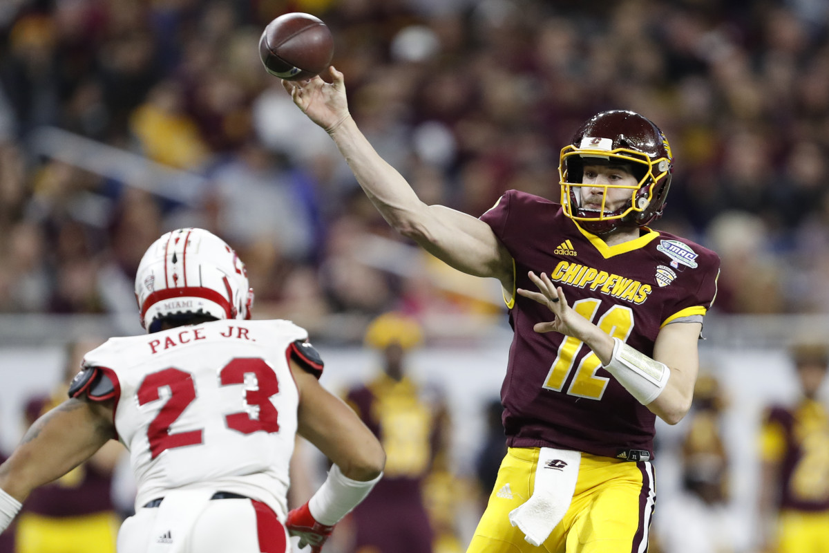 Dec 7, 2019; Detroit, MI, USA; Central Michigan Chippewas quarterback Quinten Dormady (12) passes the ball over Miami Redhawks linebacker Ivan Pace Jr. (23) during the fourth quarter in the MAC Championship game at Ford Field. Mandatory Credit: Raj Mehta-USA TODAY Sports