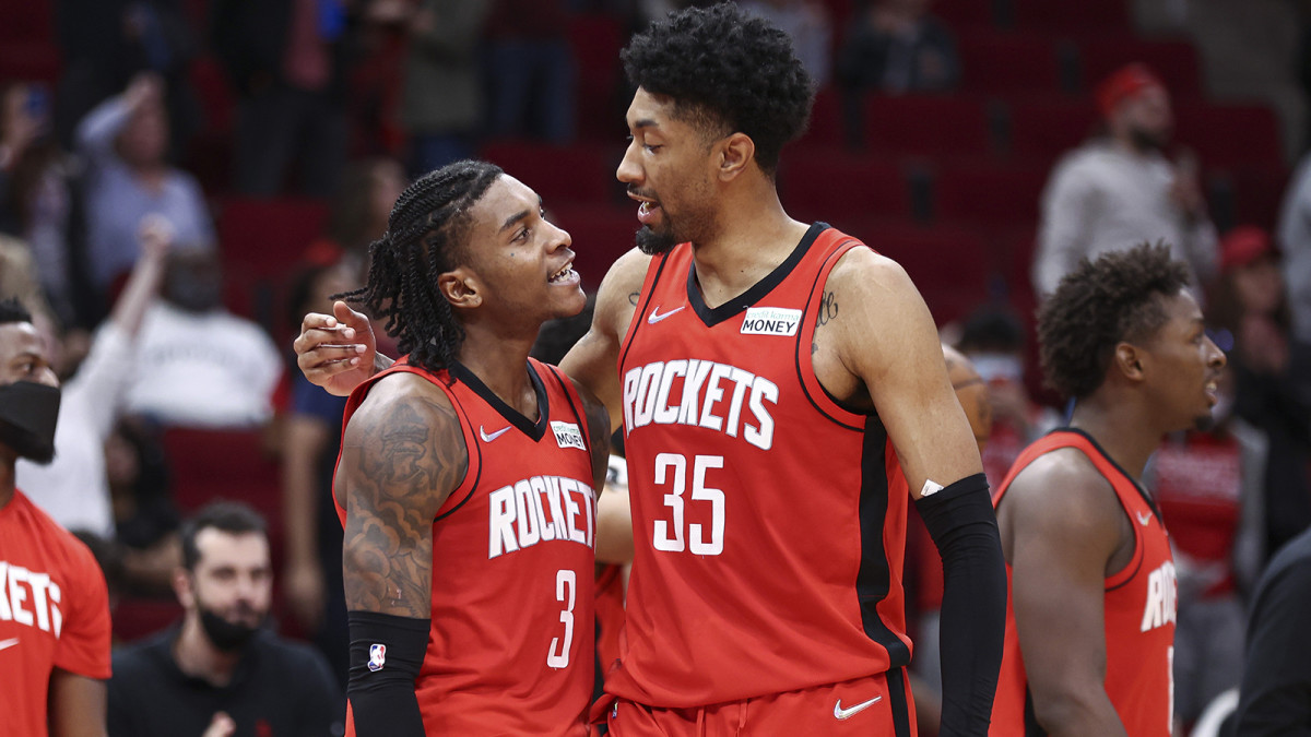 Houston Rockets guard Kevin Porter Jr. (3) and center Christian Wood (35) react after a play during overtime against the Charlotte Hornets.