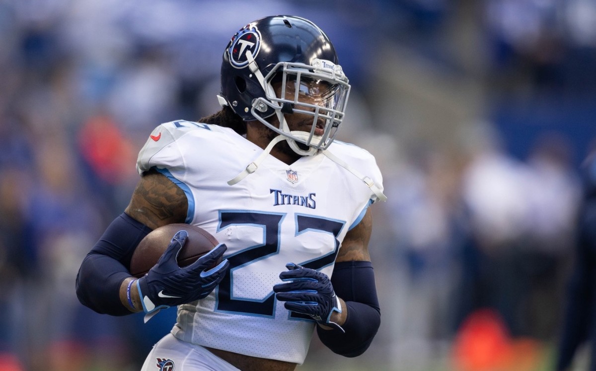 Tennessee Titans running back Derrick Henry (22) runs the ball during warm ups against the Indianapolis Colts at Lucas Oil Stadium.