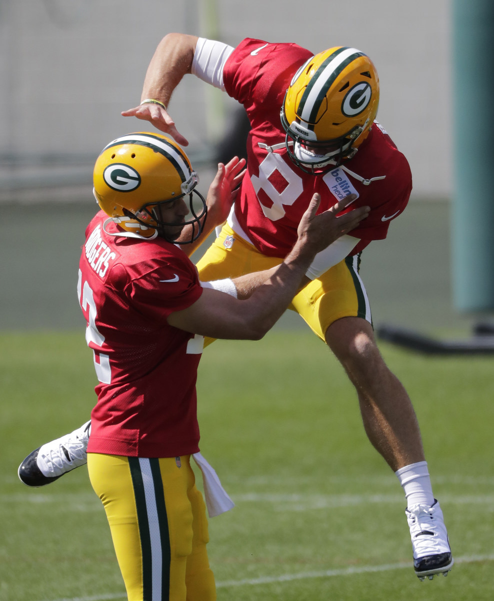 Aaron Rodgers and Tim Boyle staged mock wrestling matches during training camp in 2020. (Dan Powers/USA Today Sports Images)