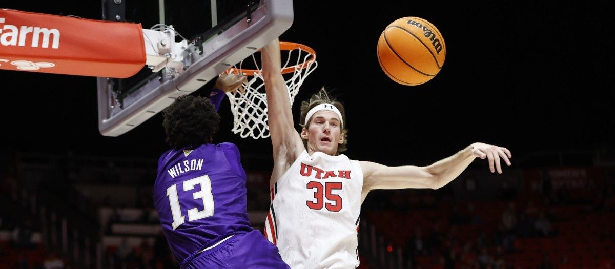Langston Wilson and Branden Carlson battle inside on Thursday night.