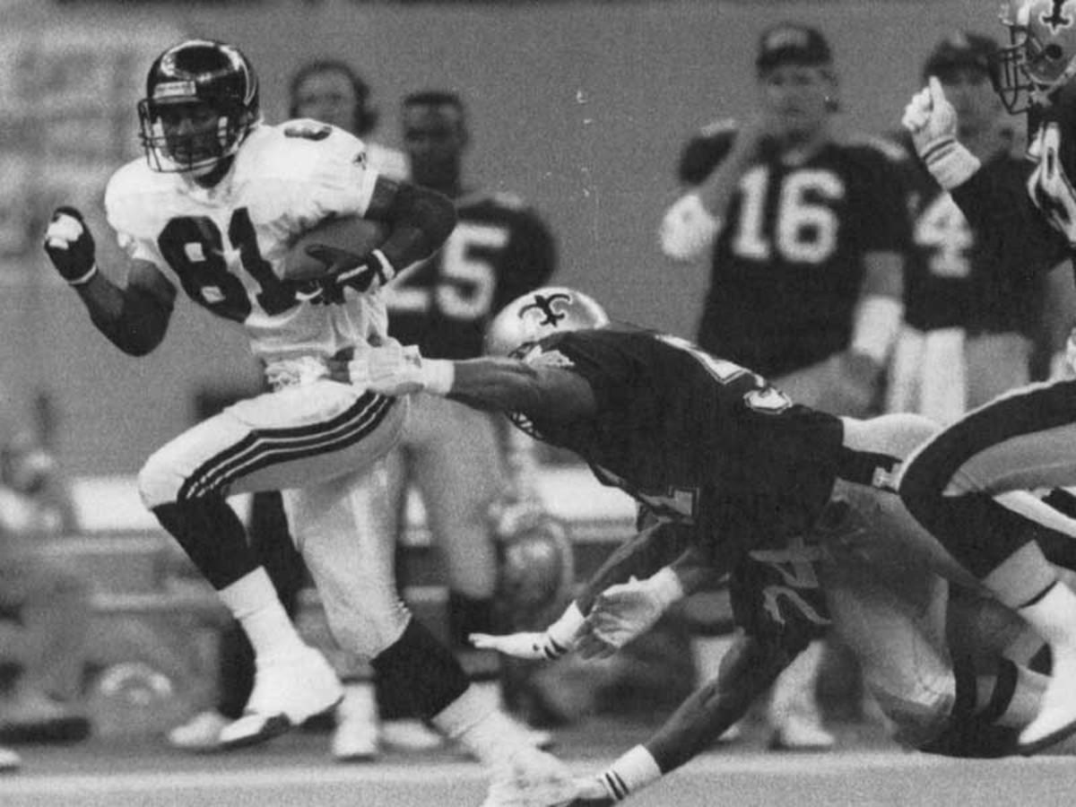 Former Falcons WR Michael Haynes (81) scores on a long touchdown reception against the New Orleans Saints in a 1991 game. Credit: thesportsdrop.com
