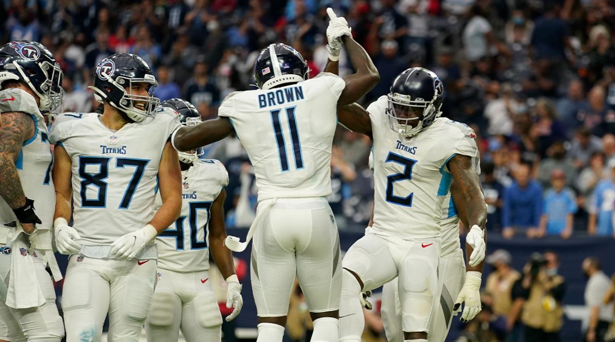 Tennessee Titans wide receiver Julio Jones (2) celebrates his touchdown with teammates during the second half of an NFL football game against the Houston Texans, Sunday, Jan. 9, 2022, in Houston.