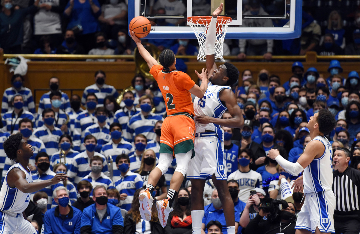 Miami Hurricanes guard Isaiah Wong (2) shoots the ball over Duke Blue Devils center Mark Williams (15) during the second half at Cameron Indoor Stadium.