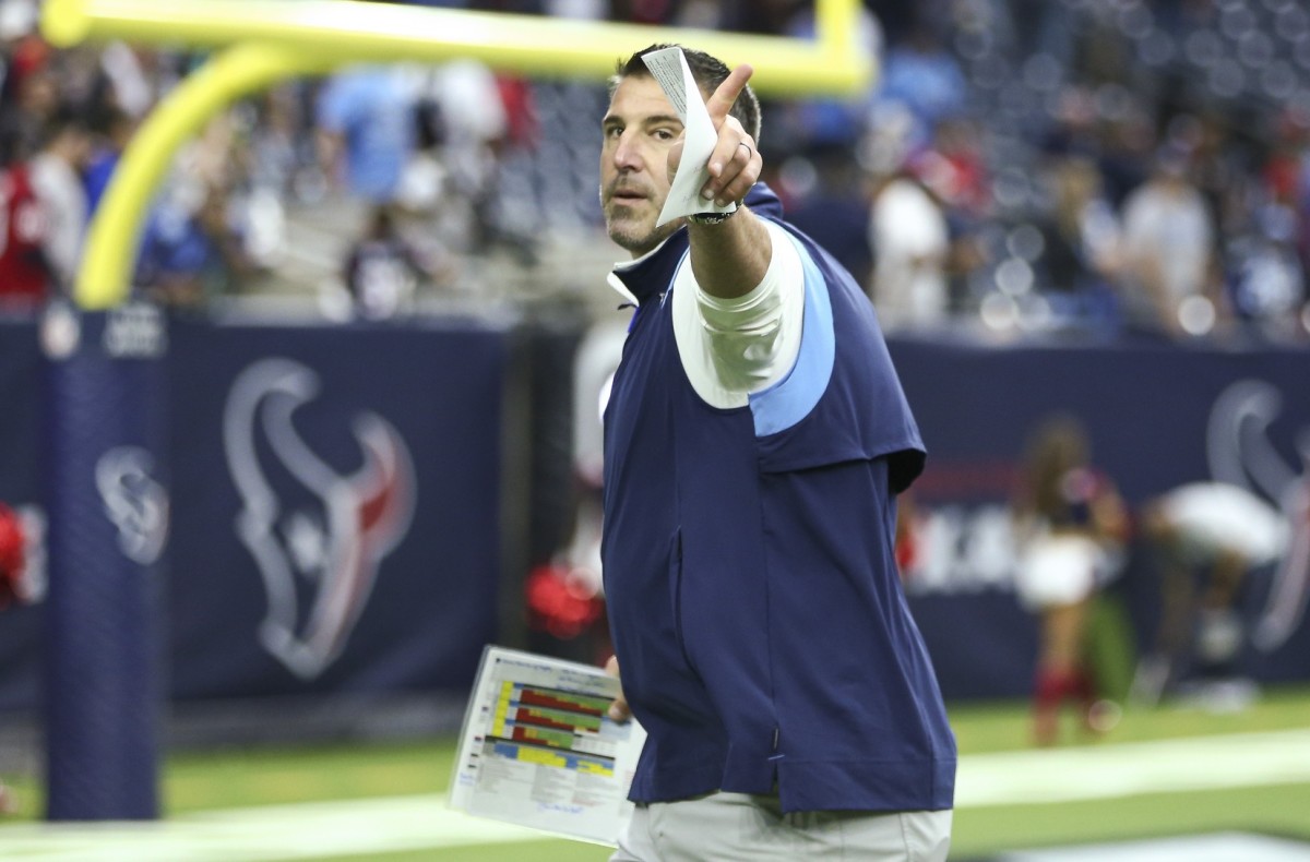 Tennessee Titans head coach Mike Vrabel jogs off the field after the game against the Houston Texans at NRG Stadium.
