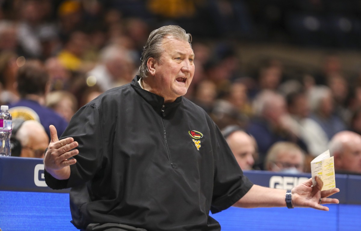 Jan 8, 2022; Morgantown, West Virginia, USA; West Virginia Mountaineers head coach Bob Huggins yells from the bench during the first half against the Kansas State Wildcats at WVU Coliseum.