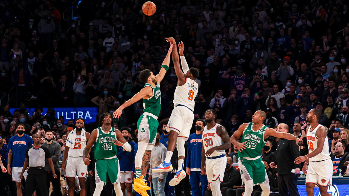 New York Knicks guard RJ Barrett (9) makes a game-winning three point basket during the fourth quarter as Boston Celtics forward Jayson Tatum.