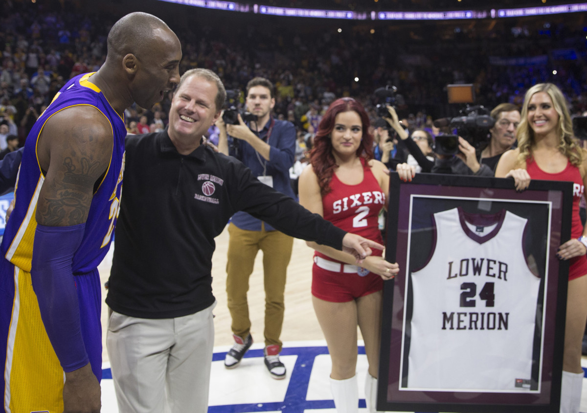 Downer kept in touch with Bryant, including presenting him with a jersey at a 2015 Sixers game.