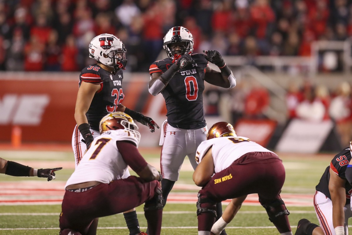 Utah linebacker Devin Lloyd stands at line of scrimmage