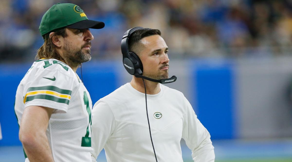 Green Bay Packers quarterback Aaron Rodgers and head coach Matt LaFleur watch from the sideline during the second half of an NFL football game against the Detroit Lions, Sunday, Jan. 9, 2022, in Detroit.