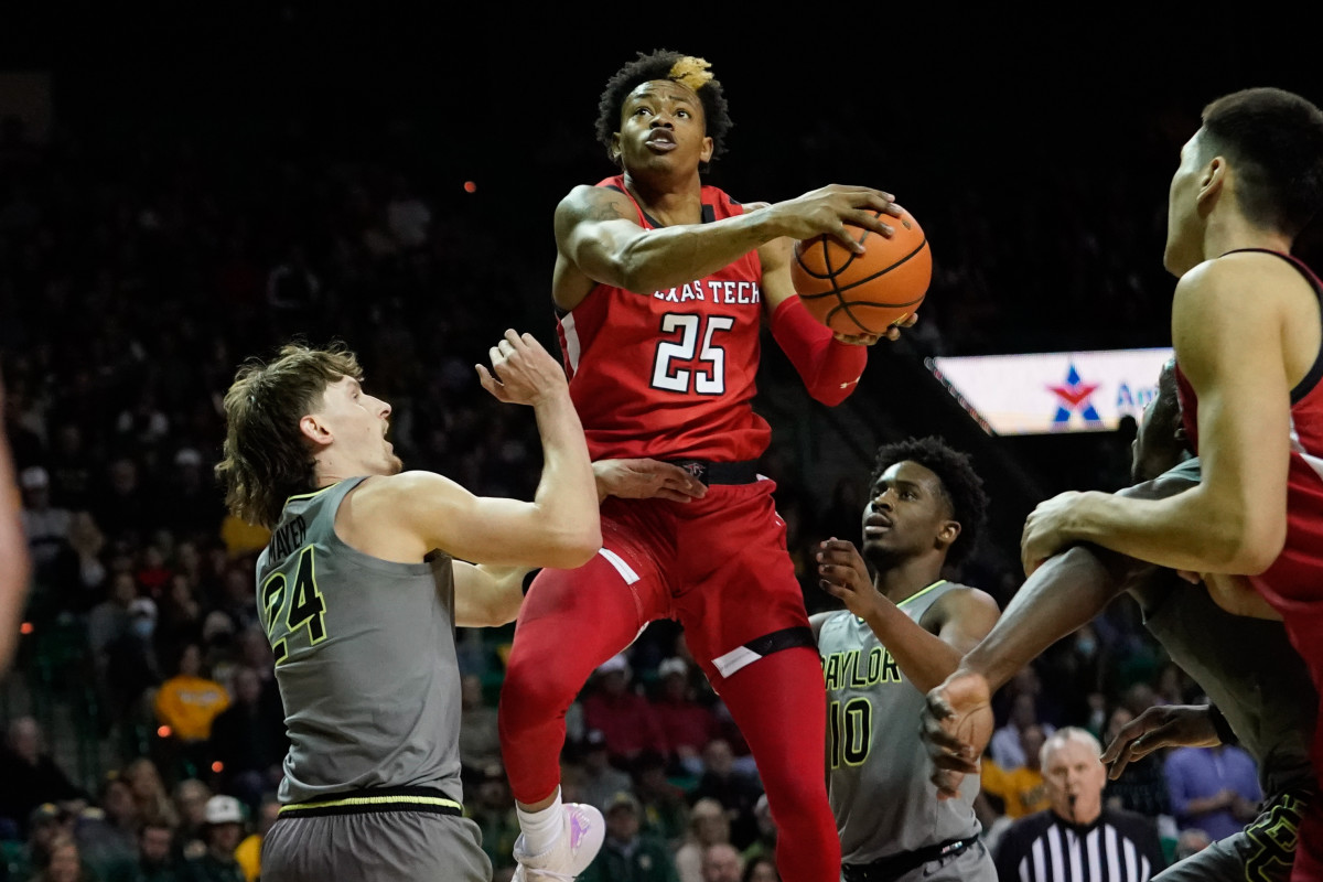 an 11, 2022; Waco, Texas, USA; Texas Tech Red Raiders guard Adonis Arms (25) drives to the basket for a layup against Baylor Bears guard Matthew Mayer (24) during the first half at Ferrell Center.
