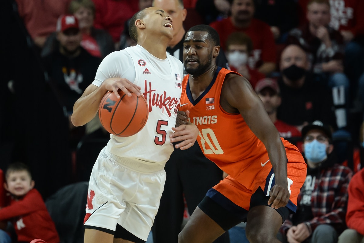 Jan 11, 2022; Lincoln, Nebraska, USA; Nebraska Cornhuskers guard Bryce McGowens (5) reacts to a foul from Illinois Fighting Illini guard Da'Monte Williams (20) in the second half at Pinnacle Bank Arena. Mandatory Credit: Steven Branscombe-USA TODAY Sports
