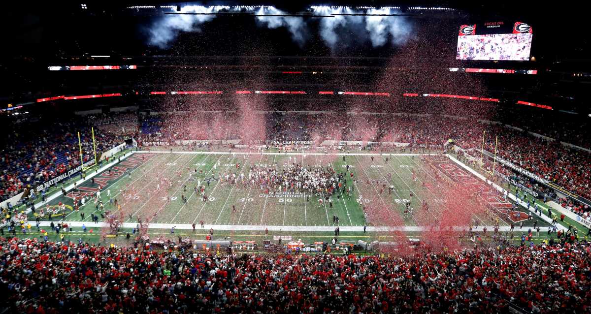 Confetti rains down as Georgia Bulldogs celebrate a 33-18 victory over Alabama Crimson Tide on Monday, Jan. 10, 2022, at the College Football Playoff National Championship at Lucas Oil Stadium in Indianapolis.
