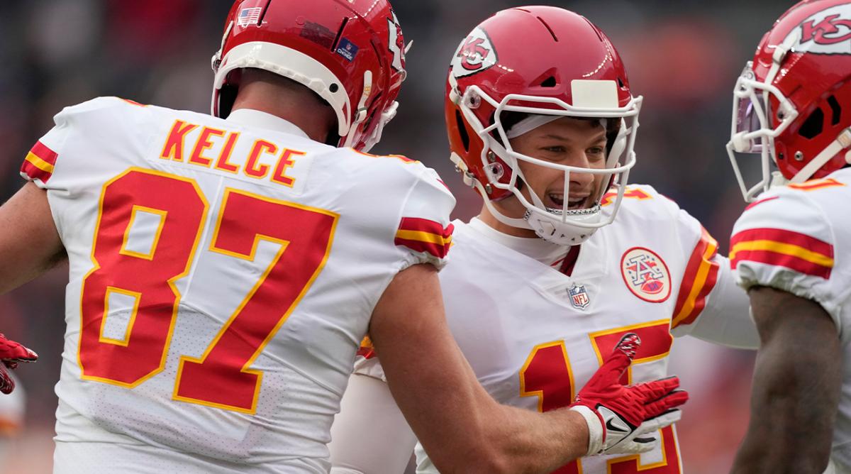 Kansas City Chiefs tight end Travis Kelce (87) celebrates after catching a touchdown pass from quarterback Patrick Mahomes (15) during the first half of an NFL football game against the Denver Broncos Saturday, Jan. 8, 2022, in Denver.