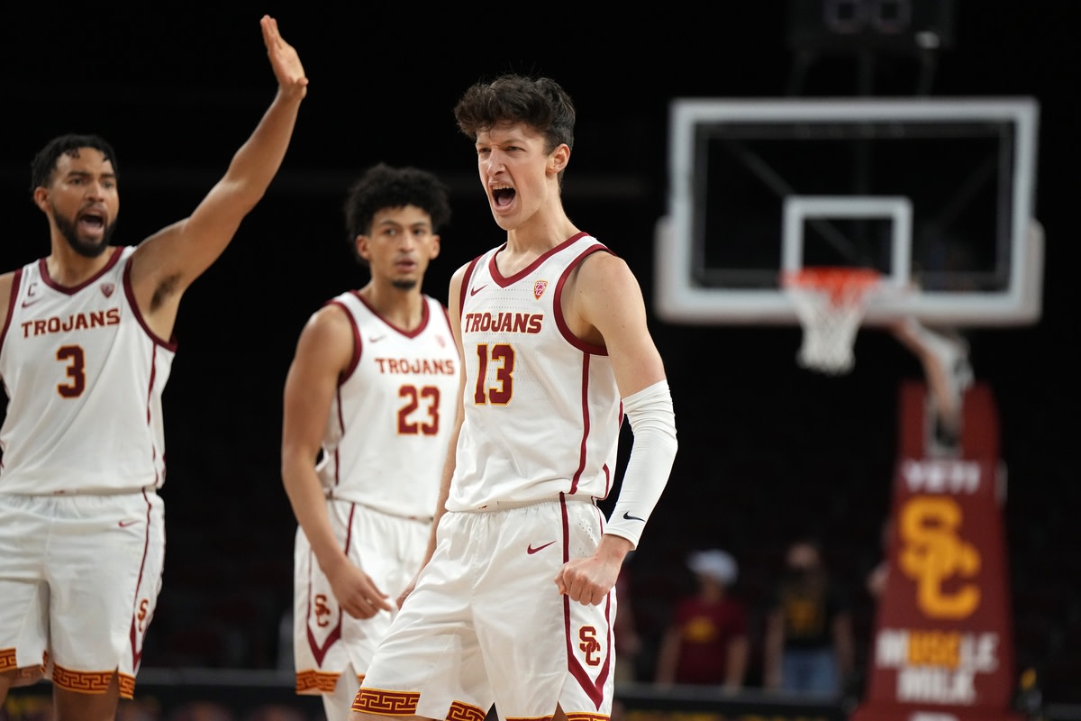 Jan 13, 2022; Los Angeles, California, USA; Southern California Trojans guard Drew Peterson (13) celebrates against the Oregon State Beavers in the second half at Galen Center. USC defeated OSU 81-71. Mandatory Credit: Kirby Lee-USA TODAY Sports