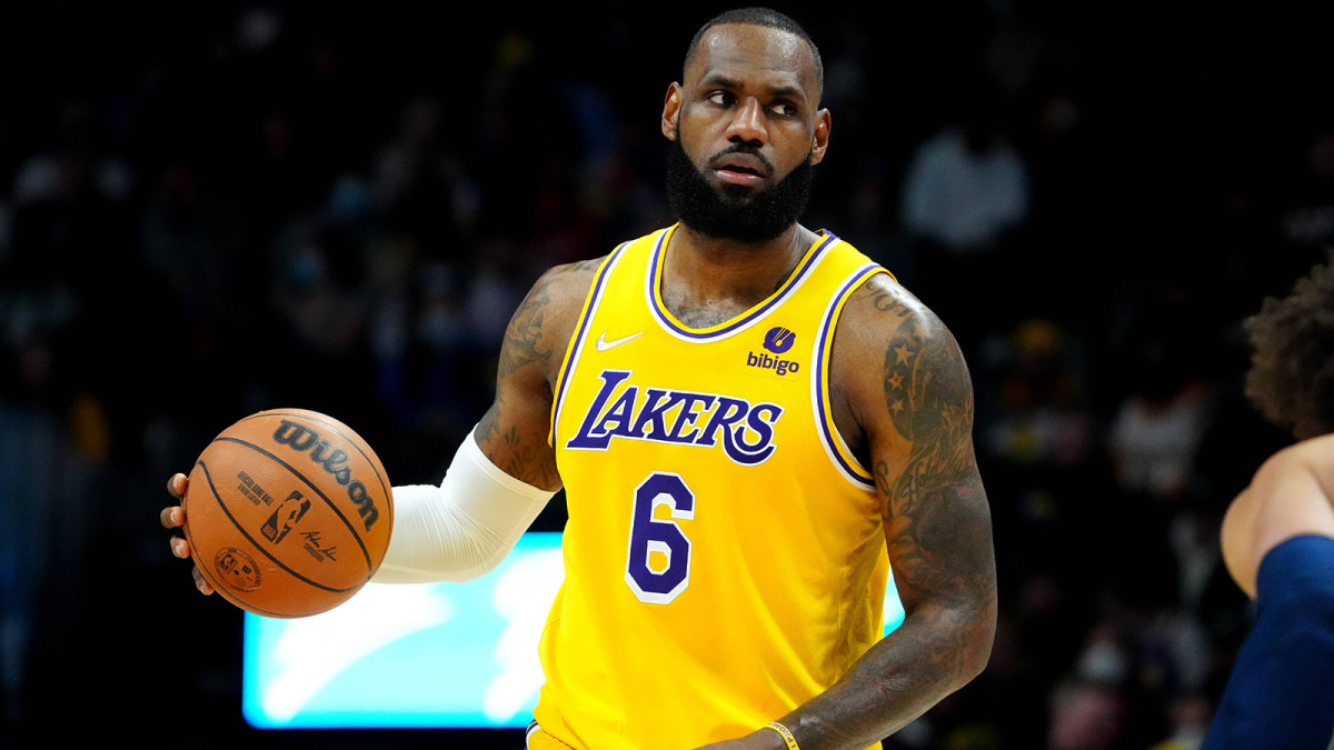Los Angeles Lakers forward LeBron James (6) dribbles the ball in the second half against the Denver Nuggets at Ball Arena.