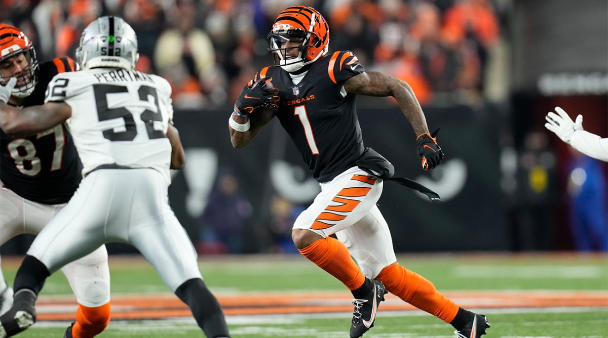 Cincinnati Bengals' Ja'Marr Chase (1) runs during the second half of an NFL wild-card playoff football game against the Las Vegas Raiders, Saturday, Jan. 15, 2022, in Cincinnati.