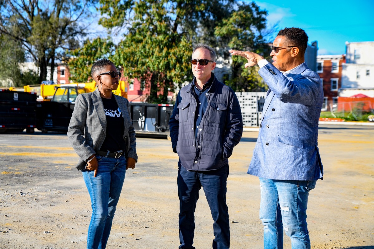 Josh Harris with Mosaic Development Partners' Leslie Smallwood Lewis and Greg Reaves.