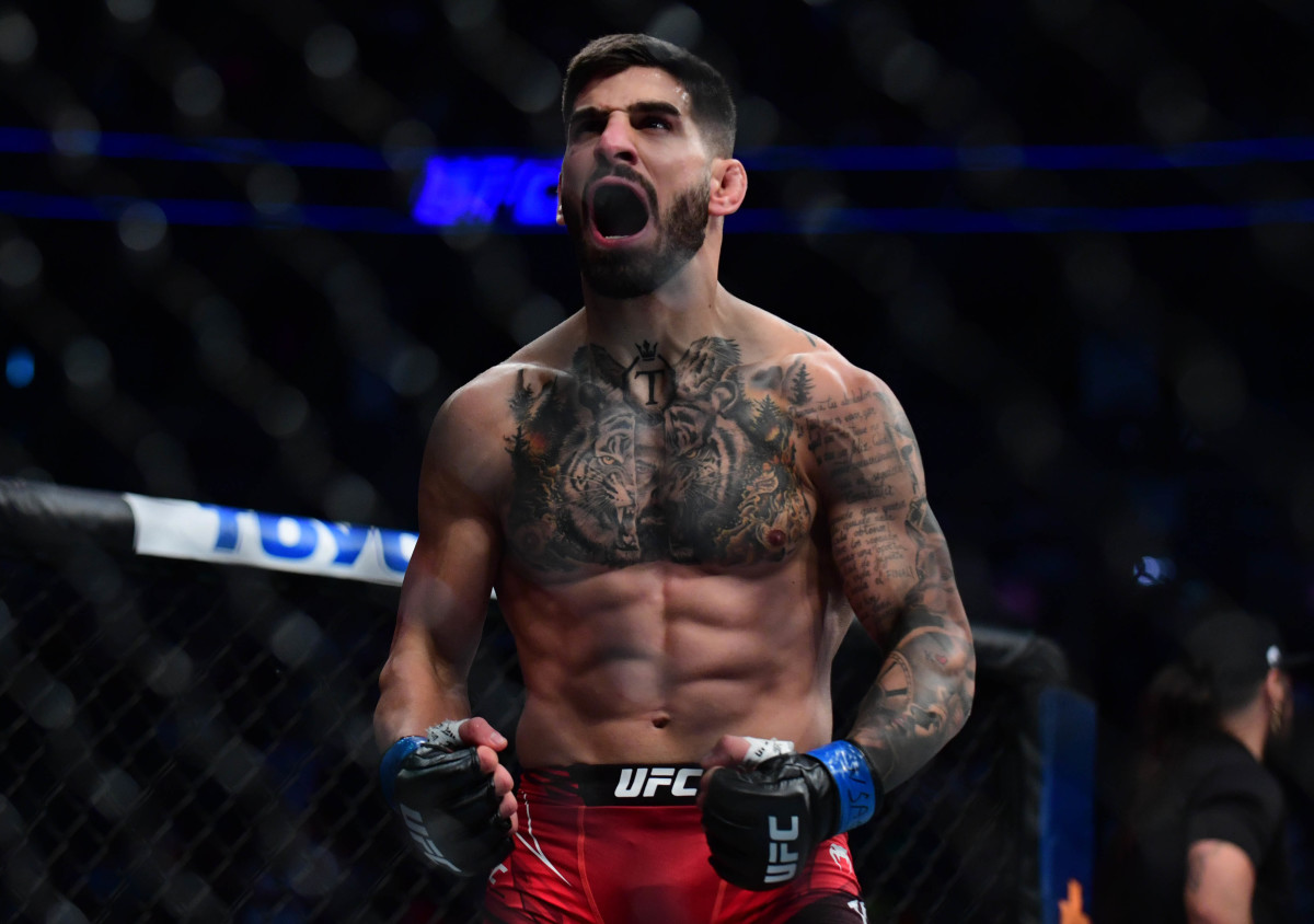 Ilia Topuria celebrates his knockout victory against Ryan Hall during UFC 264 on July 10, 2021.