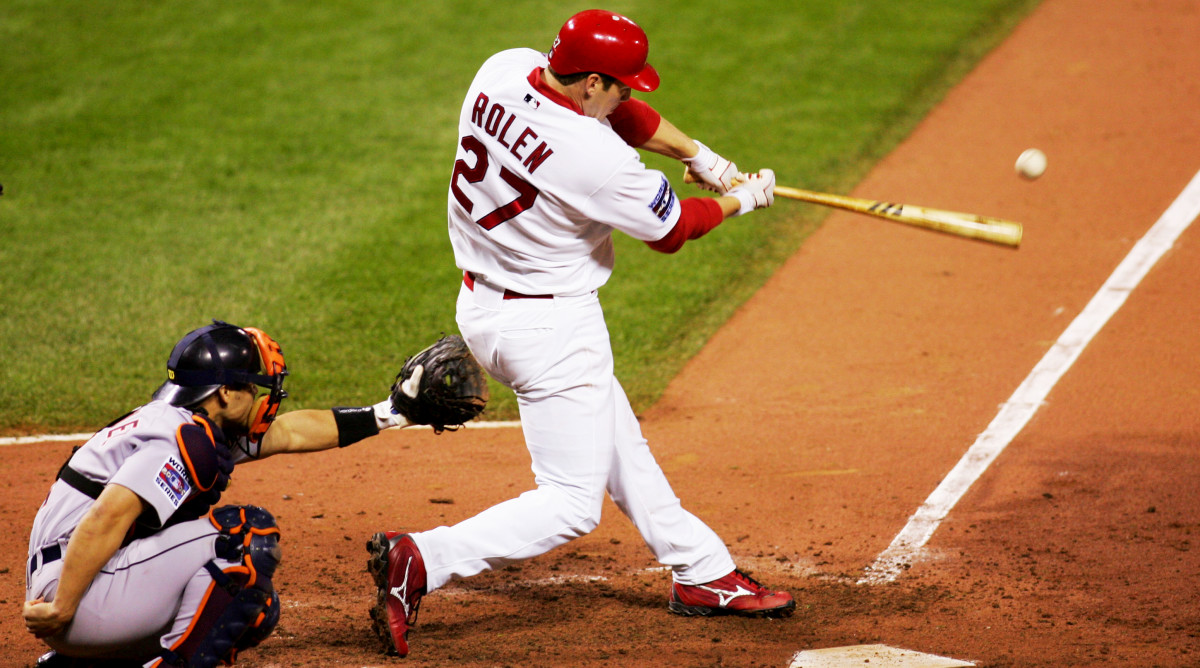 Oct 26, 2006; St. Louis, MO, USA; St. Louis Cardinals third baseman Scott Rolen hits a double during the 6th inning of game 4 of the World Series against the Detroit Tigers at Busch Stadium in St. Louis, Missouri.