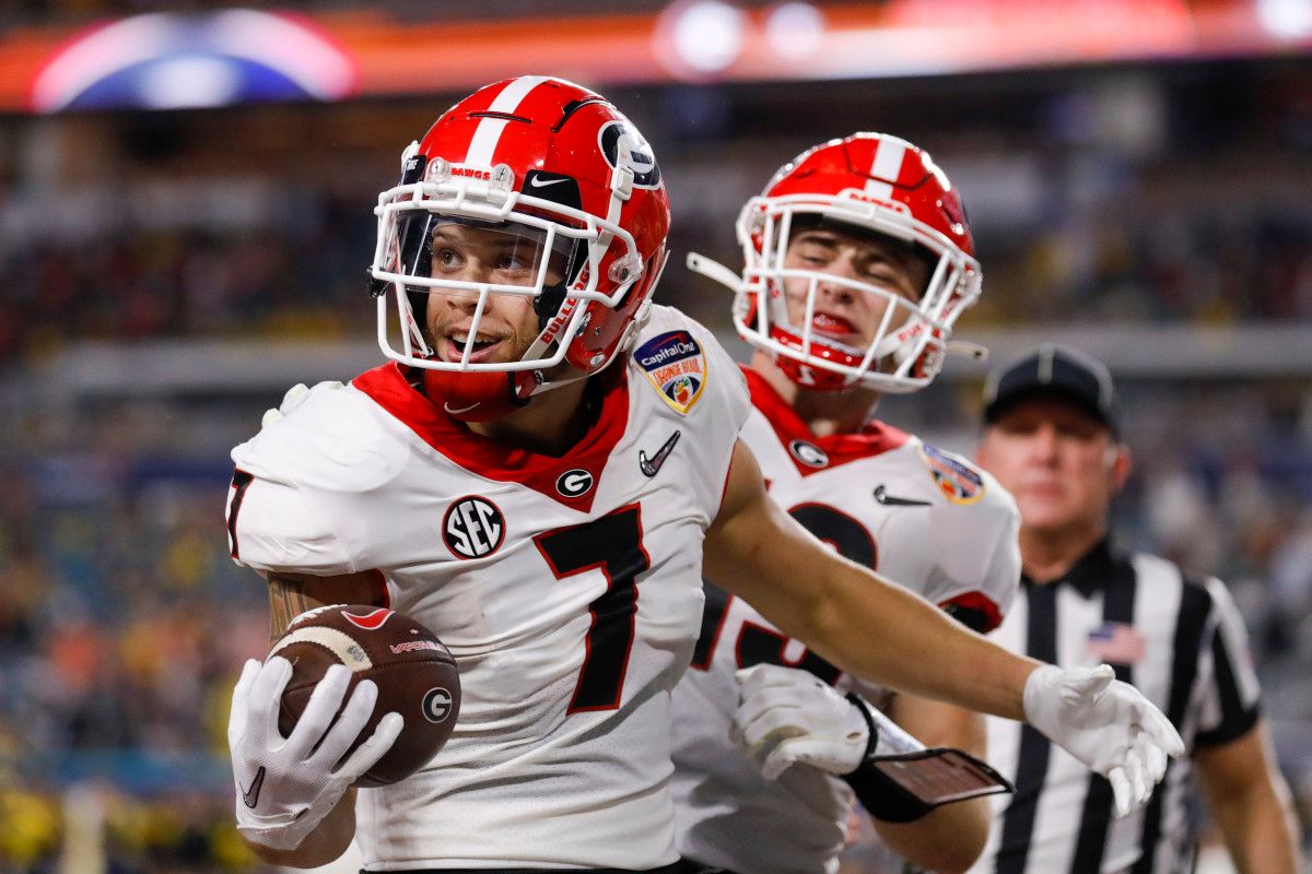 Georgia Bulldogs wide receiver Jermaine Burton (7) celebrates in the end zone after scoring a touchdown against the Michigan Wolverines in the second quarter during the Orange Bowl college football CFP national semifinal game at Hard Rock Stadium.