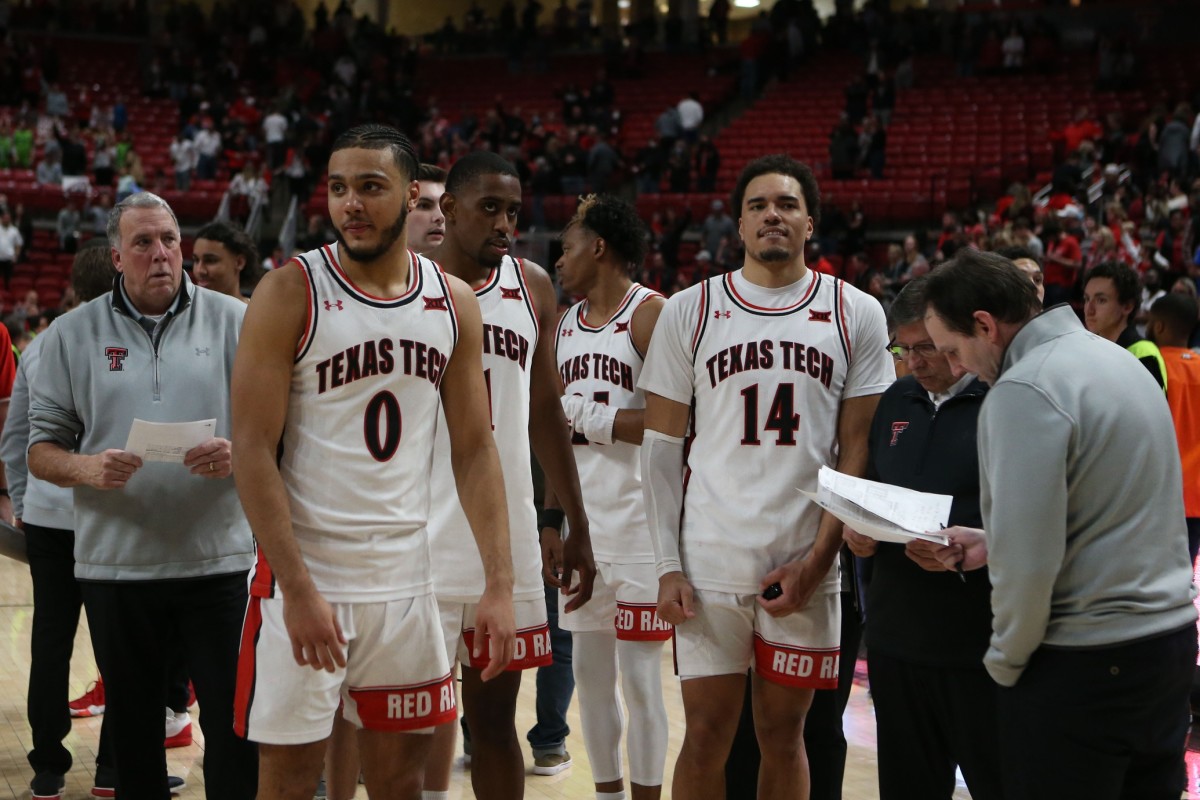 Jan 13, 2022; Lubbock, Texas, USA; Texas Tech Red Raiders forward Kevin Obanor (0), forward Bryson Williams (11) and guard Adonis Arms (25) and forward Marcus Santos-Silva (14) with head coach Mark Adams after the game against the Oklahoma State Cowboys at United Supermarkets Arena. Mandatory Credit: Michael C. Johnson-USA TODAY Sports