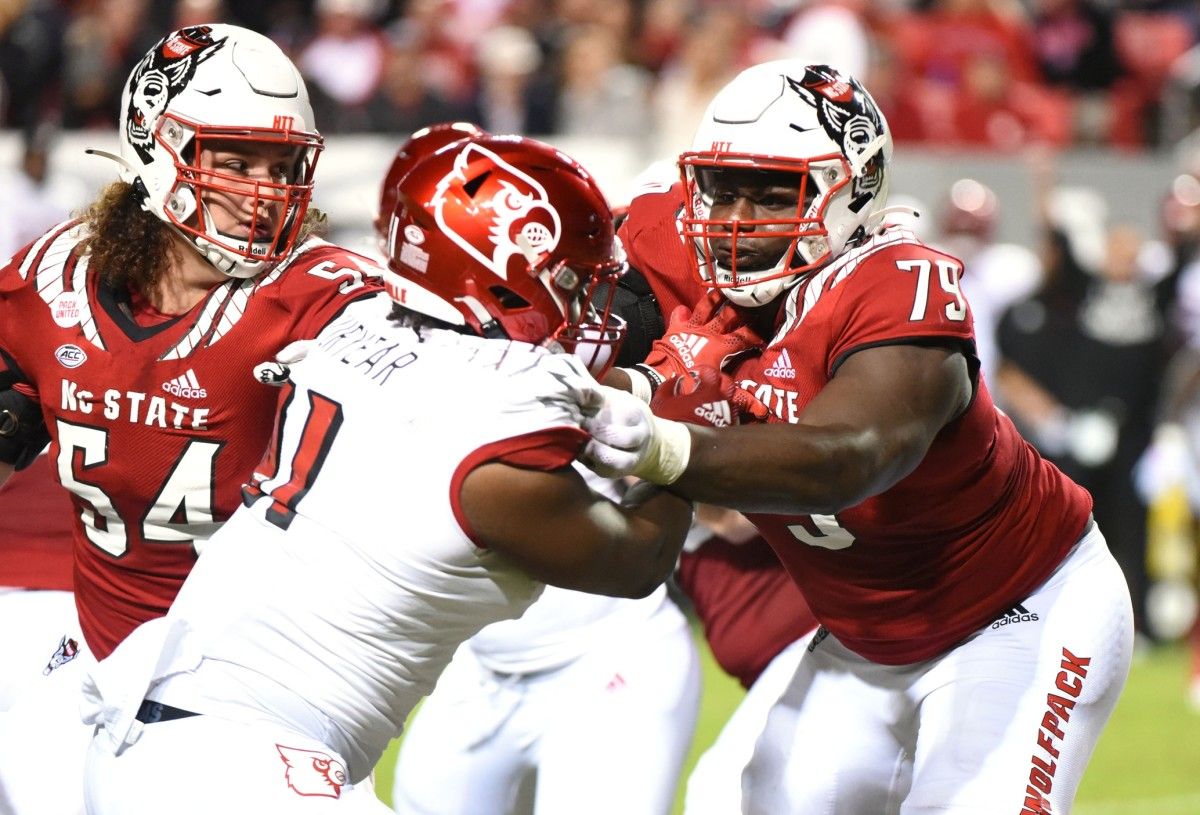 NC State tackle Ikem Ekwonu blocking