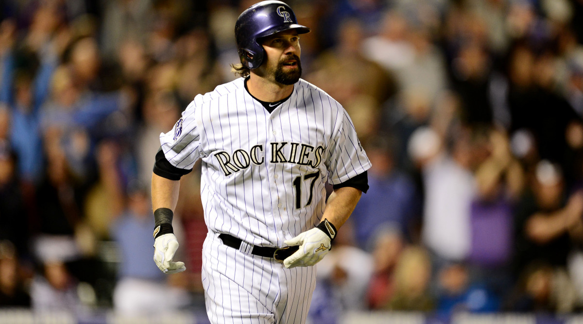 May 31, 2013; Denver, CO, USA; Colorado Rockies first baseman Todd Helton (17) reacts to his home run in the ninth inning against the Los Angeles Dodgers at Coors Field. The Dodgers defeated the Rockies 7-5 in ten innings.