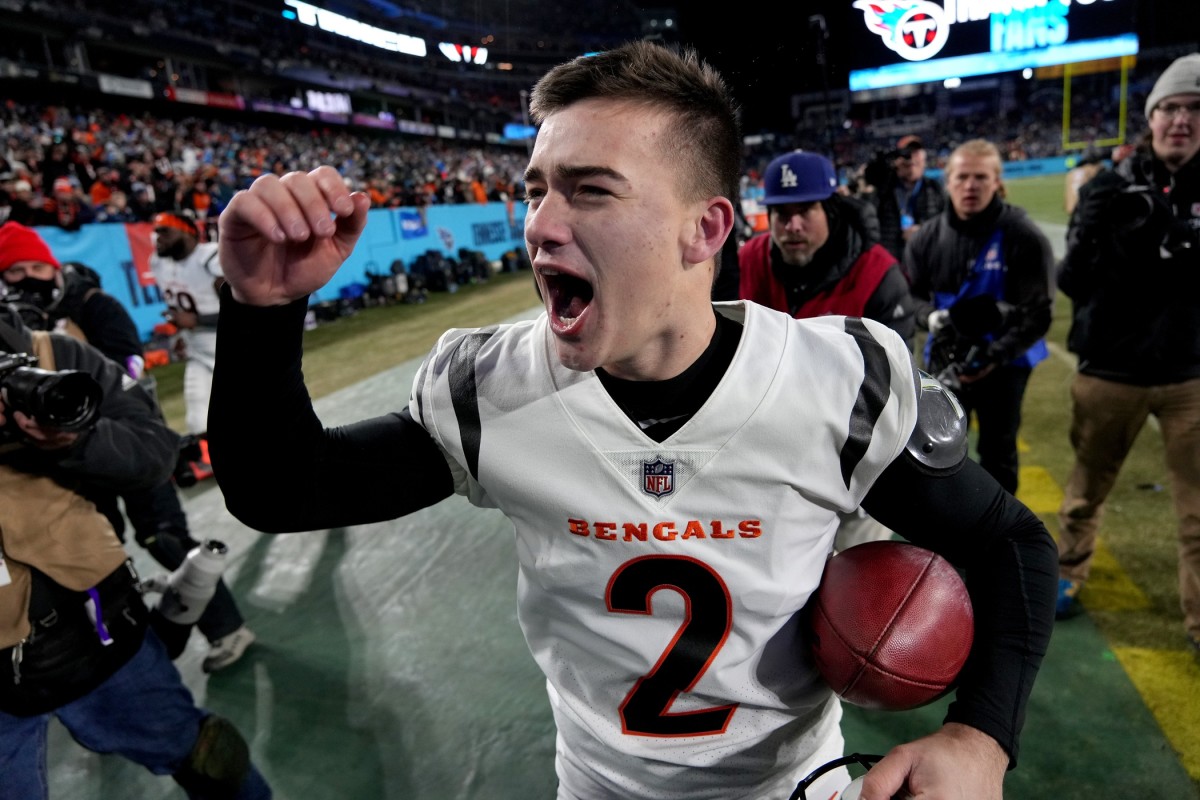 Jan 22, 2022; Nashville, Tennessee, USA; Cincinnati Bengals kicker Evan McPherson (2) celebrates after kicking the game-winning 52-yard field goal to defeat the Tennessee Titans 19-16 during the AFC Divisional playoff football game at Nissan Stadium. Mandatory Credit: Kirby Lee-USA TODAY Sports