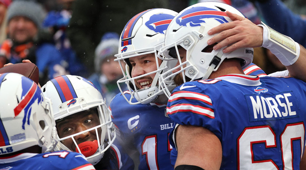 Josh Allen celebrates one of his two rushing touchdowns in a 29-15 win over Atlanta.
