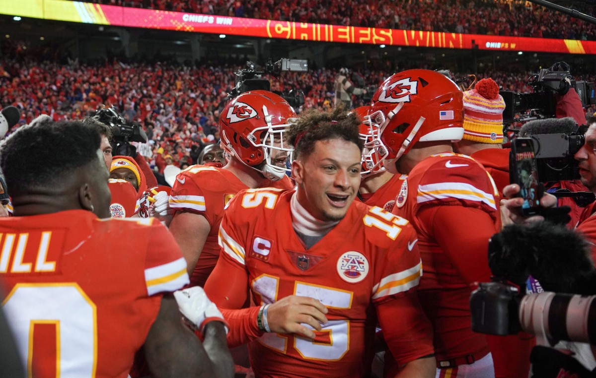 Jan 23, 2022; Kansas City, Missouri, USA; Kansas City Chiefs quarterback Patrick Mahomes (15) celebrates the win against the Buffalo Bills in overtime in the AFC Divisional playoff football game at GEHA Field at Arrowhead Stadium. Mandatory Credit: Denny Medley-USA TODAY Sports