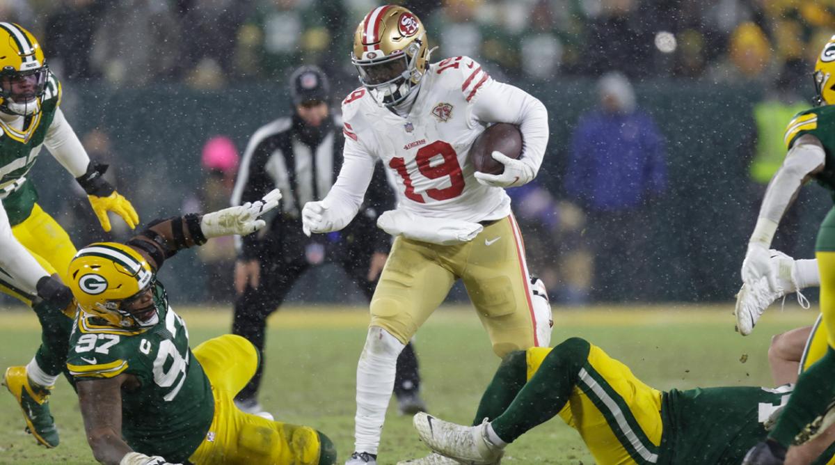 San Francisco 49ers' Deebo Samuel runs during the second half of an NFC divisional playoff NFL football game against the Green Bay Packers Saturday, Jan. 22, 2022, in Green Bay, Wis.