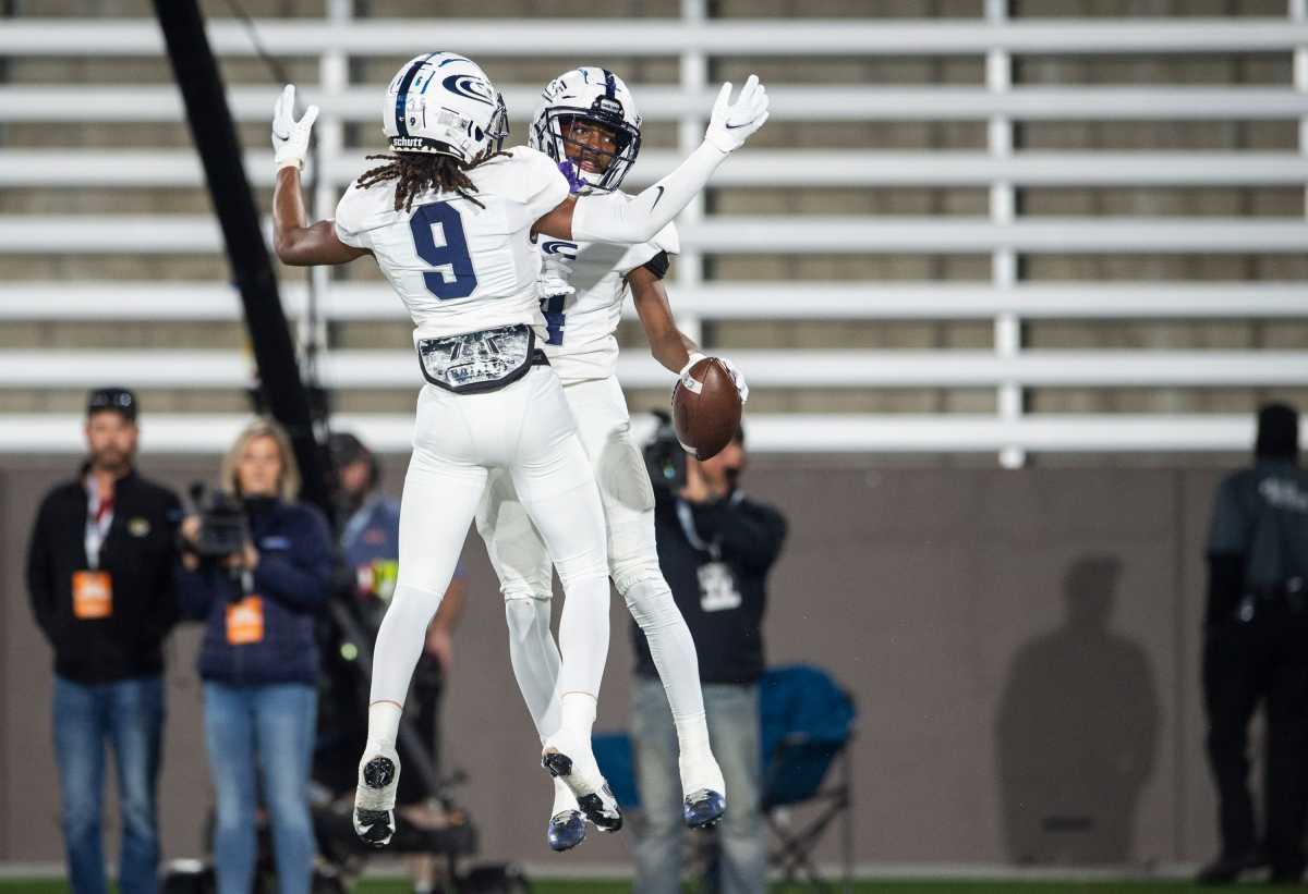 Clay-Chalkville's Mario Craver (4) celebrates his two-point conversion catch during the Class 6A football state championship at Protective Stadium in Birmingham, Ala., on Friday, Dec. 3, 2021.