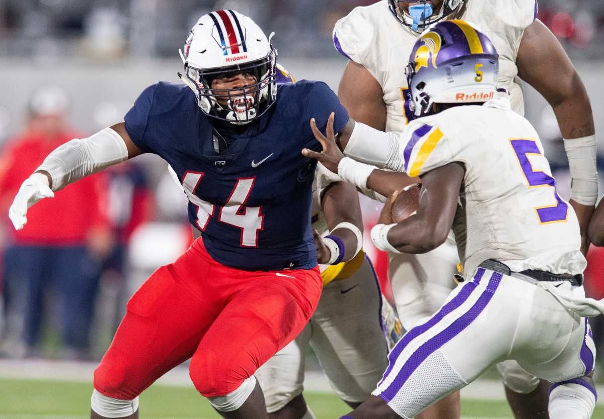 Pike Road's Khurtiss Perry sacks Pleasant Grove's Alex Young in the AHSAA Class 5A State Football Championship Game at Protective Stadium in Birmingham, Ala., on Thursday December 2, 2021.