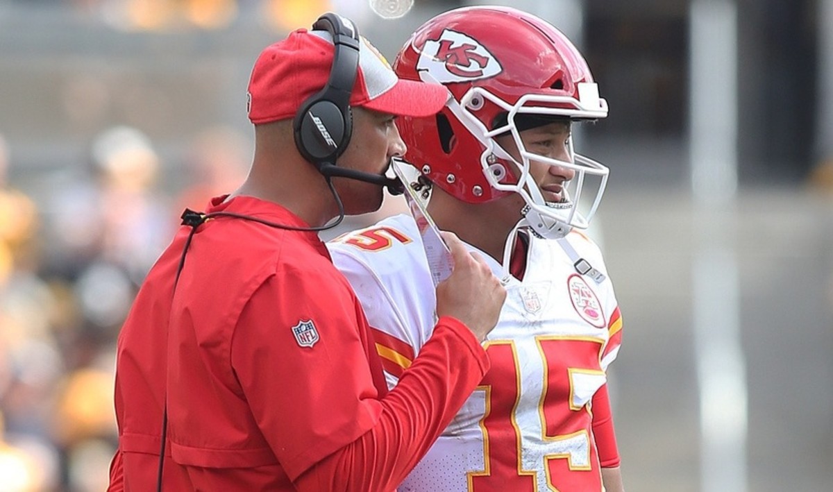 Sep 16, 2018; Pittsburgh, PA, USA; Kansas City Chiefs quarterbacks coach Mike Kafka (L) talks with quarterback Patrick Mahomes (15) against the Pittsburgh Steelers during the third quarter at Heinz Field. The Chiefs won 42-37.