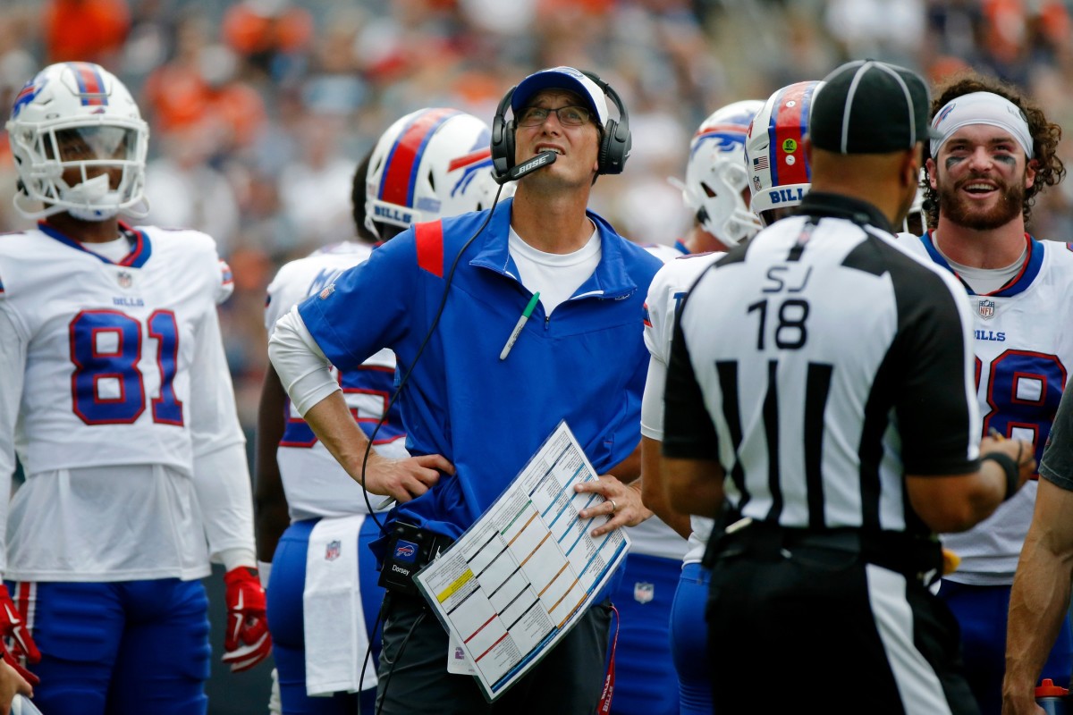Aug 21, 2021; Chicago, Illinois, USA; Buffalo Bills passing coordinator and quarterbacks coach Ken Dorsey looks on from the sideline during the first half against the Chicago Bears at Soldier Field. The Buffalo Bills won 41-15.