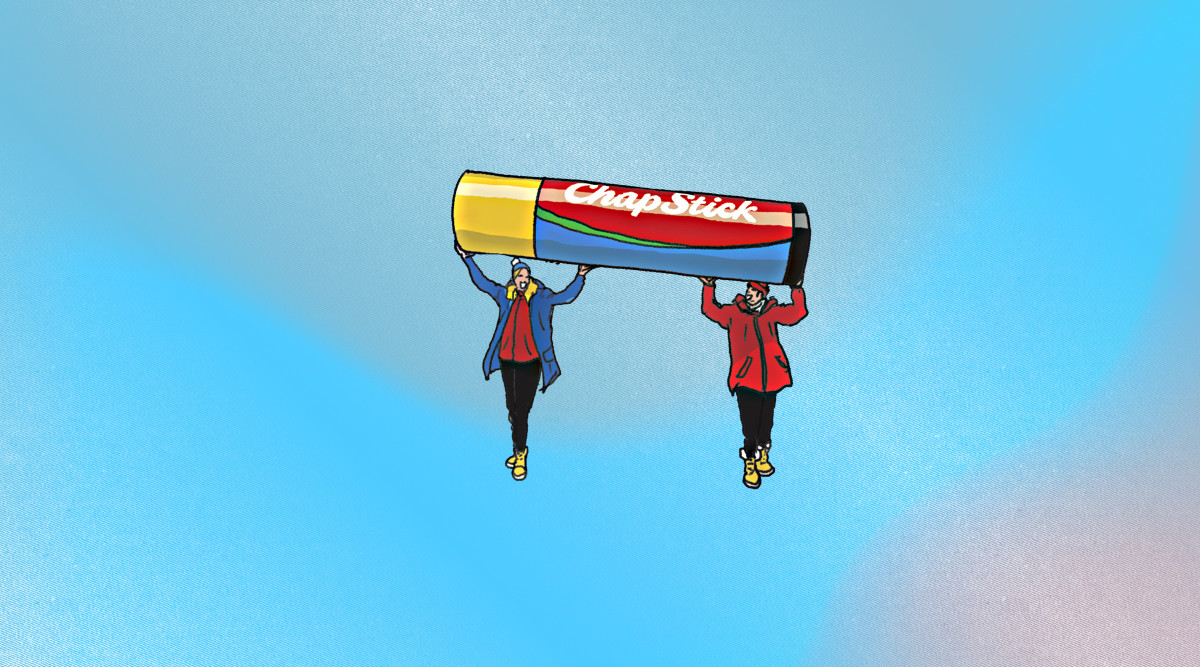 Illustration of two people holding up a tube of chapstick